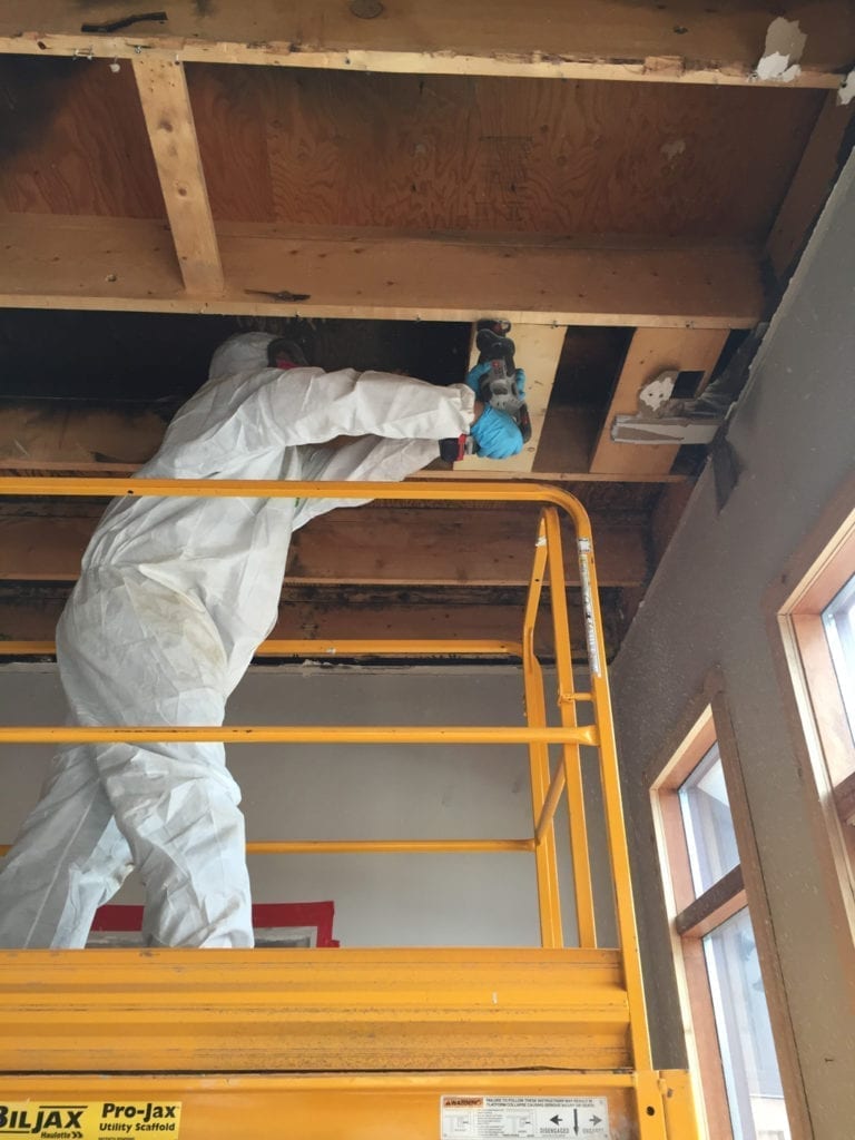 24-7 staff restoring a roof after water damage