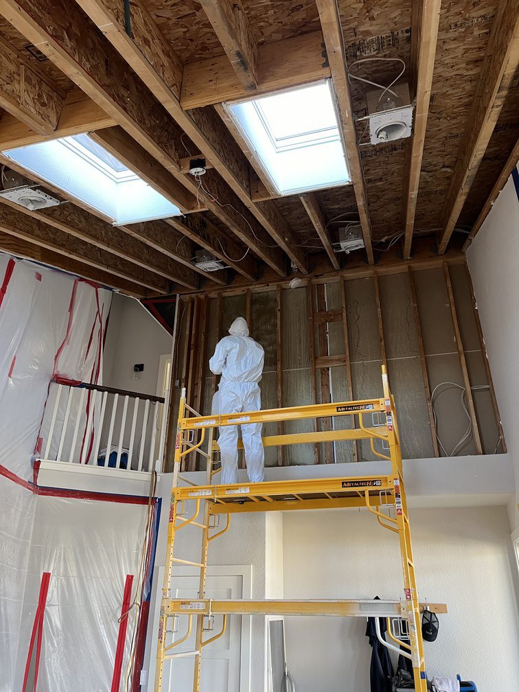 treating wood in an elevated ceiling wall