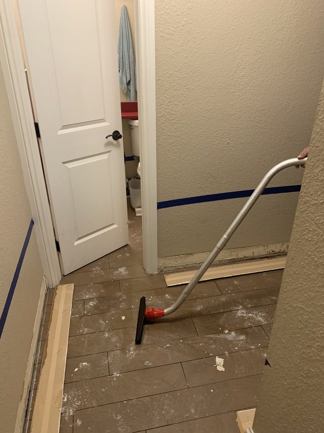 service member using a wet vac