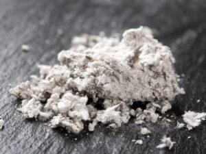 crumbly asbestos on a home floor