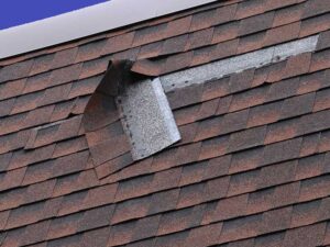 Damaged Brown Roof Shingle from Wind Damage