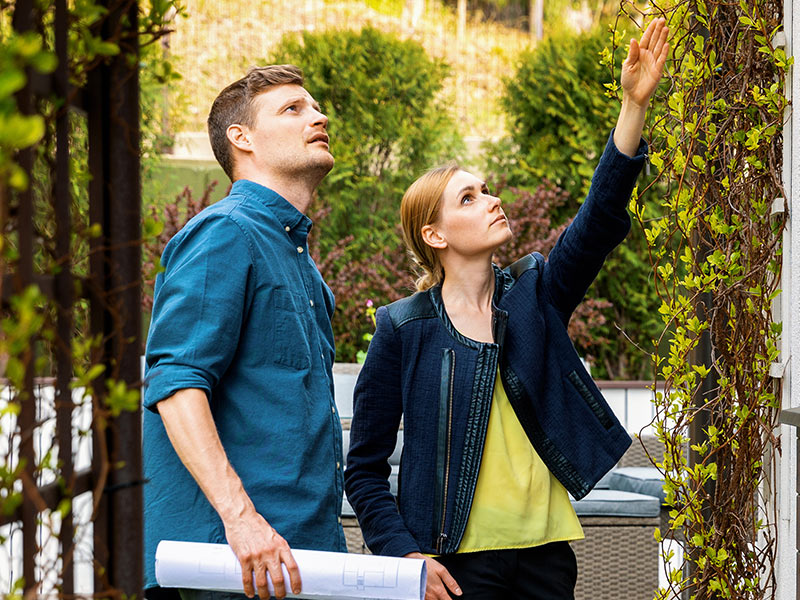 real estate agent and appraiser doing house inspection